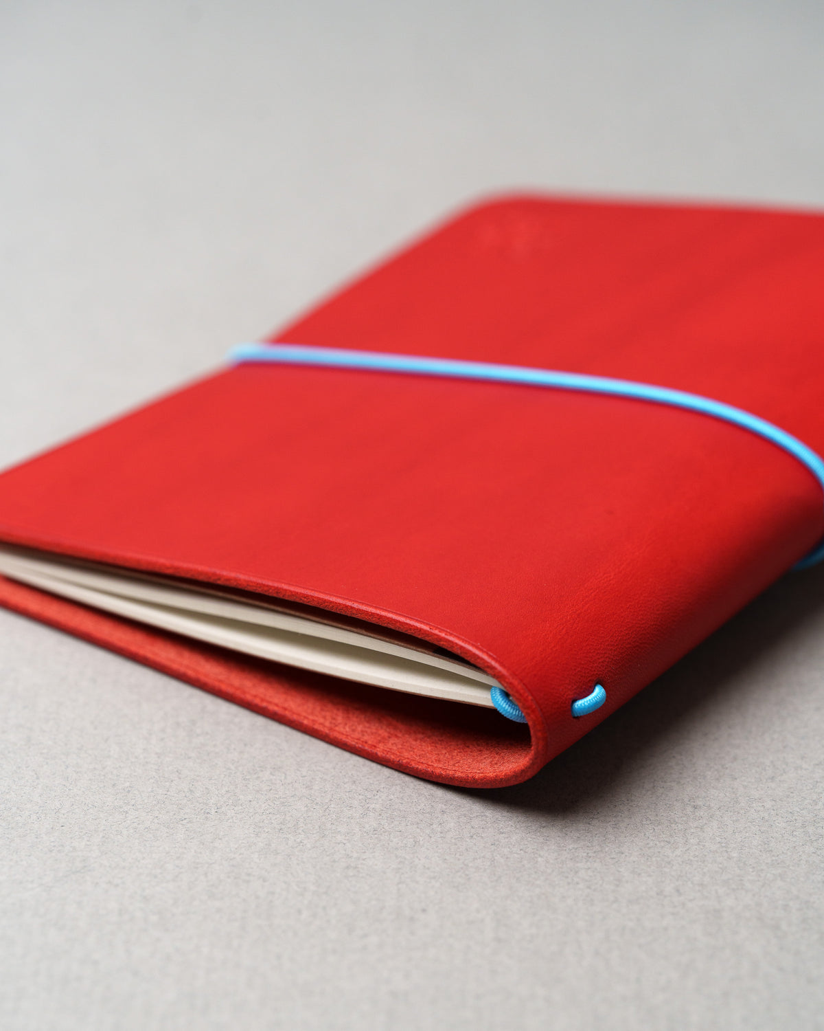 Red Buttero Leather Cover, Italian vegetable-tanned leather, studio photograph