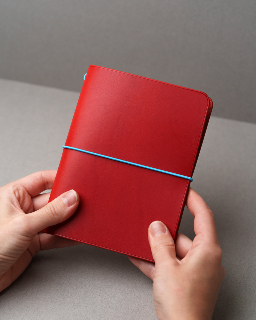 Red Buttero Leather Cover, Italian vegetable-tanned leather, studio photograph