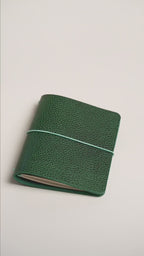 Green Dollaro A6 cover, pebble grain catching the light