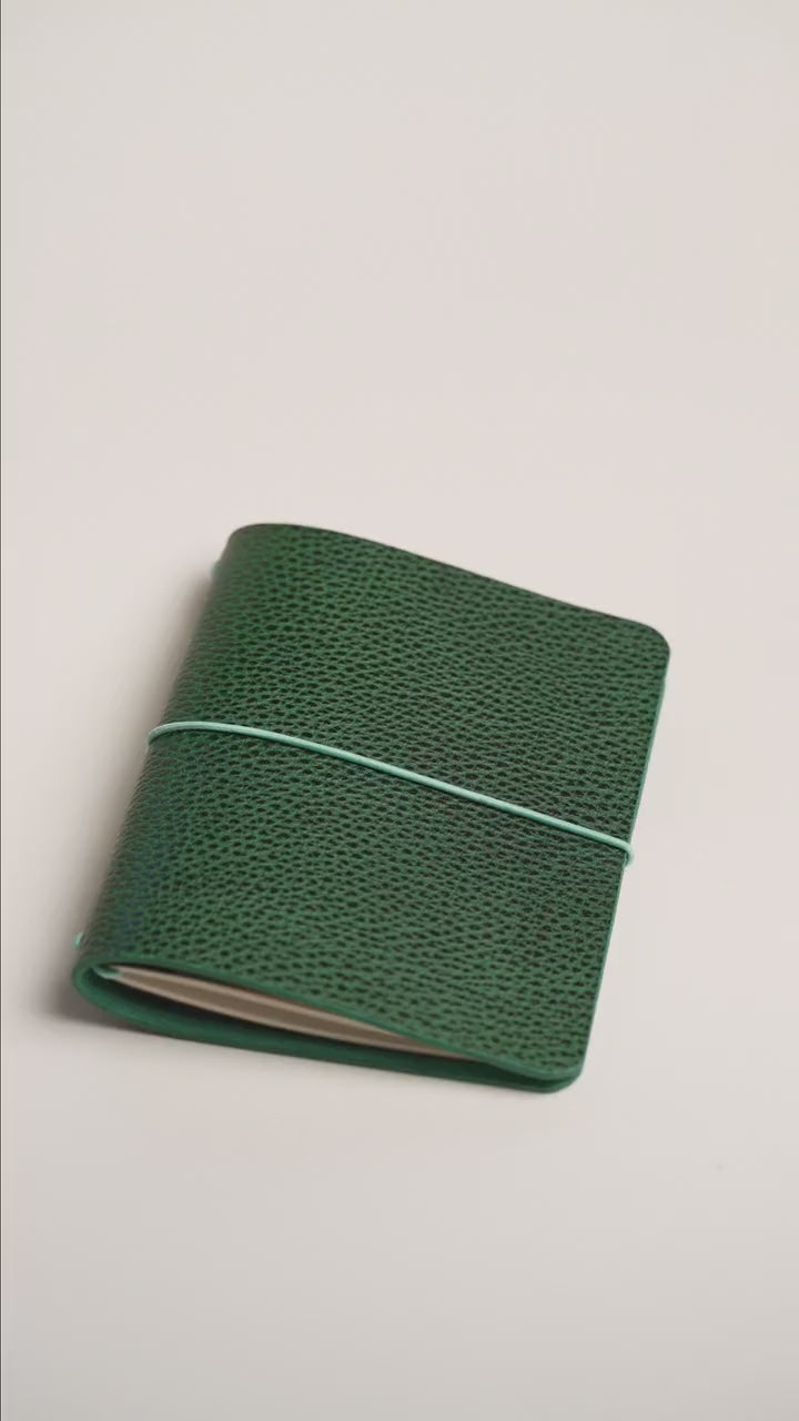 Green Dollaro A6 cover, pebble grain catching the light
