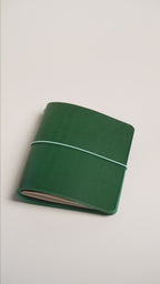 Green Buttero A6 trifold cover, the finished piece in the workshop